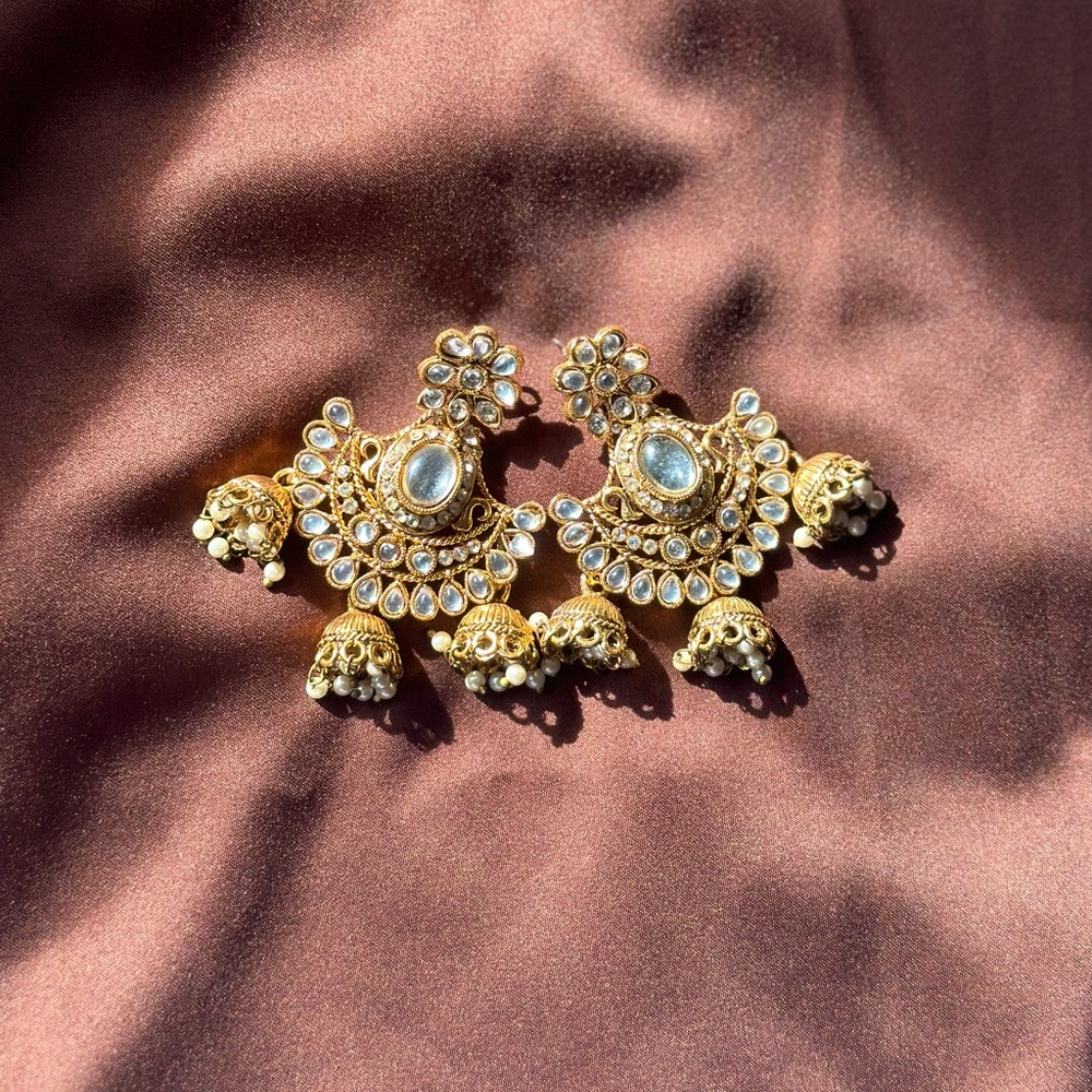 Gold tone kundan earrings
